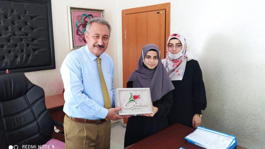  Halk Eğitimi Merkezi Müdürlüğümüz bünyesinde Kur'an-ı Kerim'i Güzel Okuma yarışmasında İkincilik başarısı.